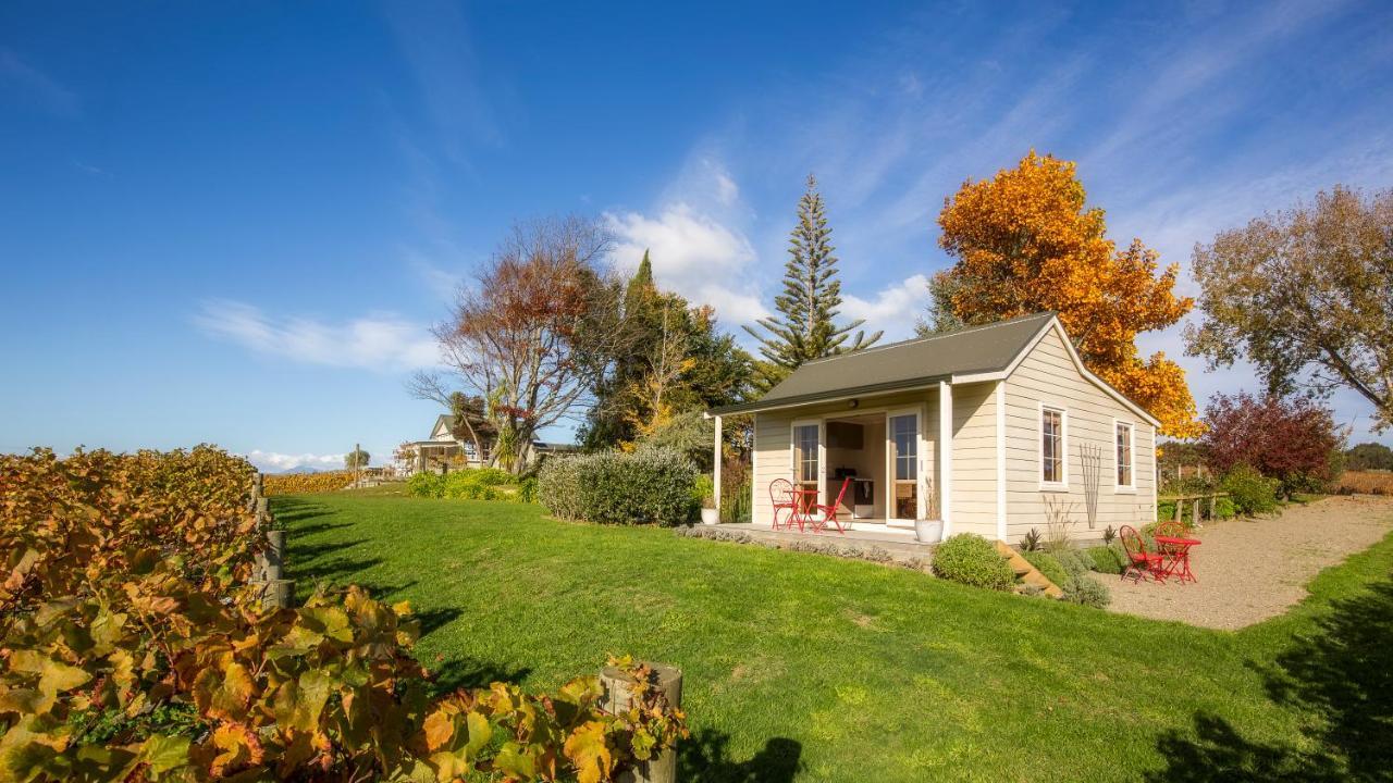 Kina Beach Cottages Tasman Экстерьер фото